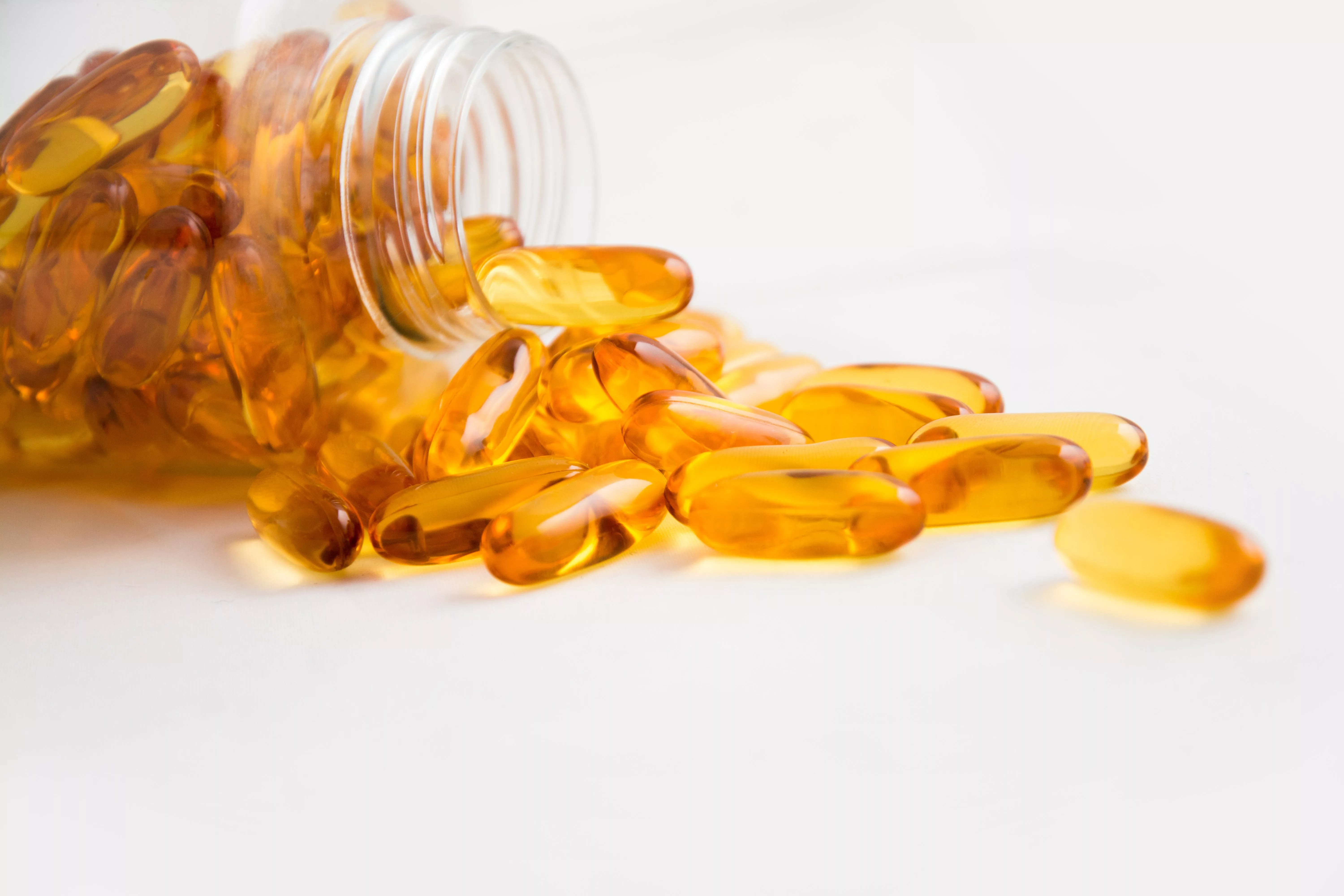 Nährstoffmangel erkennen, Bild von orangen Supplement Tabletten